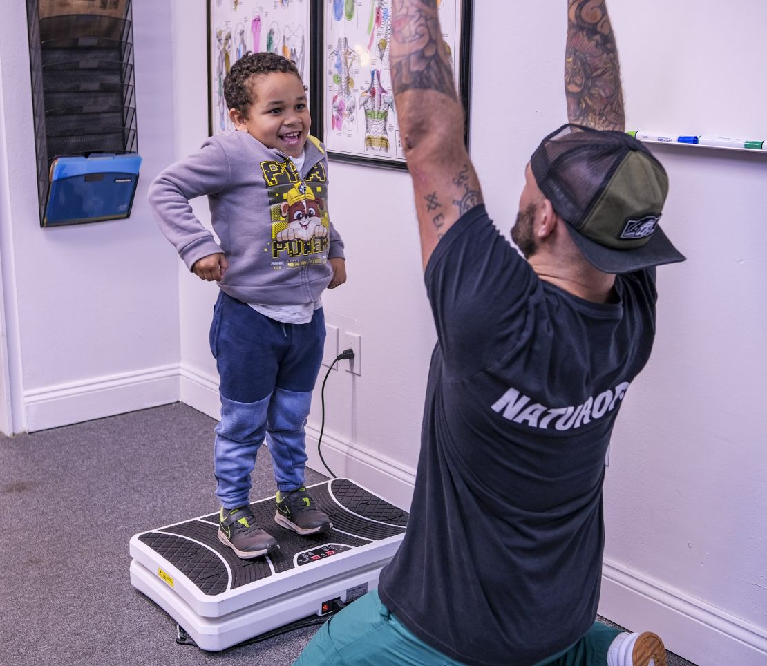 working with a child at truly heal wellness in akron ohio, recovery and health is not just for adults. here Conrad is seenworking with a young boy who needs help with central nervous system regulation and suffers from hyperactivity
